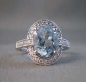 Aquamarine and Diamond right hand ring.