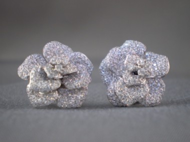 Diamond Rosebud earrings crafted in 18k white gold.